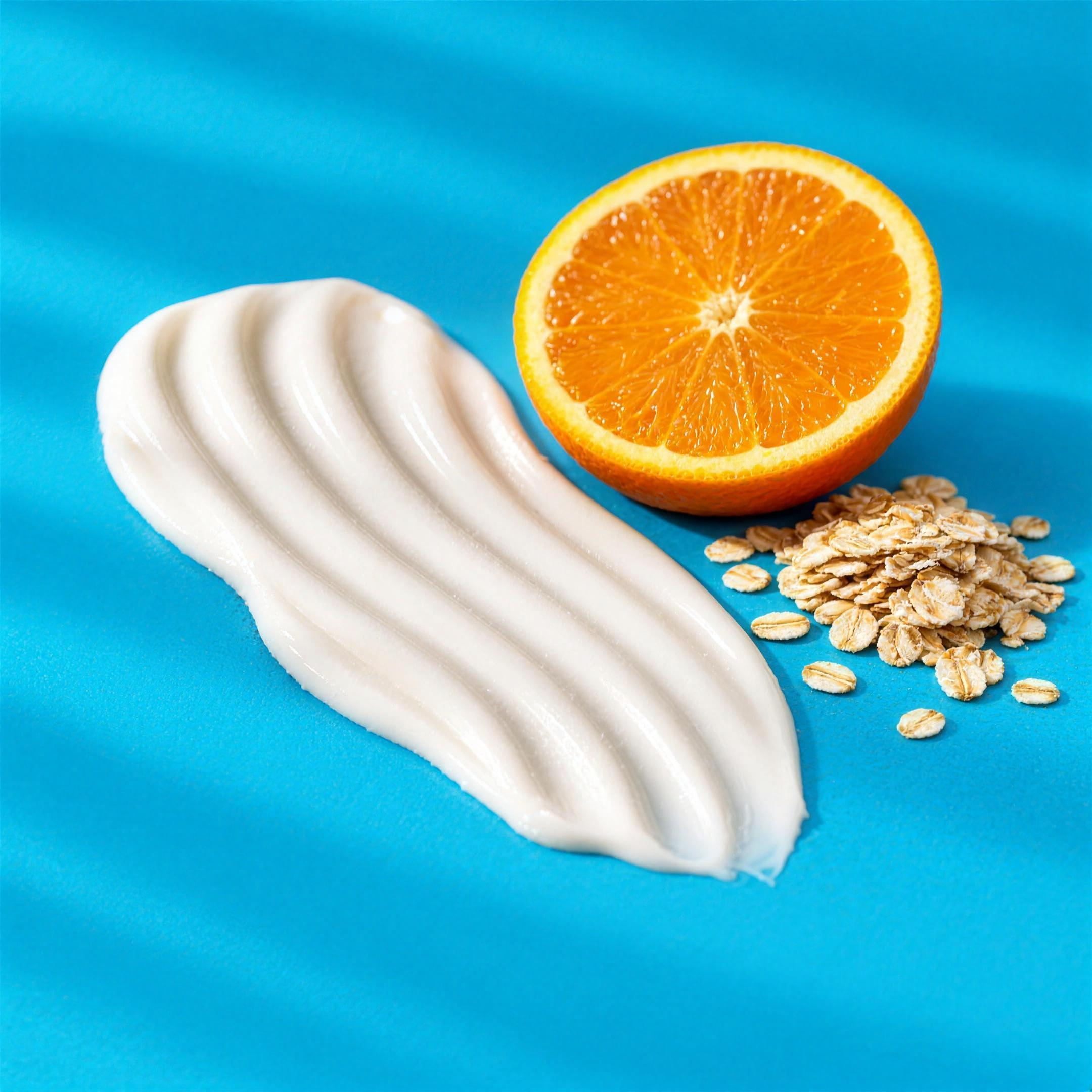 Texture del latte corpo: emulsione bianca fluida, con arancia e avena